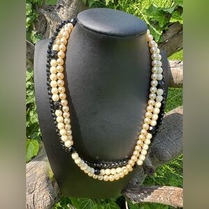 Vintage ivory-black pearl glass beaded necklace triple strand.